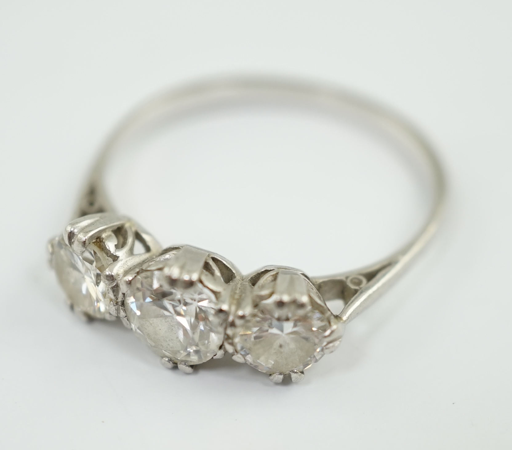 A platinum? and three stone diamond set ring